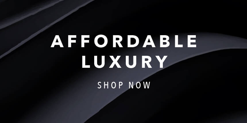 Black silk folded to produce curves with the text "Affordable Luxury shop now"